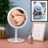 Merkloos Decopatent® Beauty Breeze Mirror - Make-Up Spiegel Met LED Verlichting & Ventilatie - 360° Draaibaar - Make Up 5x Vergrootspiegel -Cosmeticawinkel 1200x1200 872
